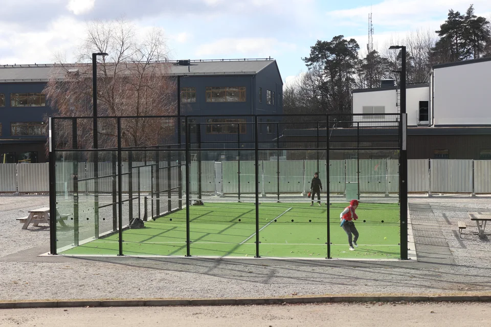 Players on an outdoor padel court in Bagartorp, Sweden